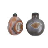 TWO CHINESE BANDED AGATE SNUFF BOTTLES. Qing Dynasty. One formed as a pebble, 5 cm, the other of