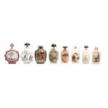 A COLLECTION OF EIGHT CHINESE INSIDE PAINTED SNUFF BOTTLES. 19th / 20th Century. One signed Si