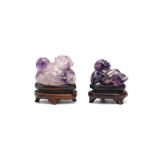 TWO CHINESE AMETHYST CARVINGS OF BOYS. Qing Dynasty. The larger representing Liu Hai, a three-legged