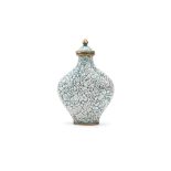 A CHINESE ‘MOSAIC PATTERN’ ENAMELLED SNUFF BOTTLE. Qing Dynasty. With white fragments of enamel