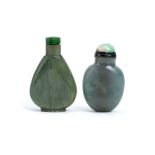TWO CHINESE JADE SNUFF BOTTLES. Qing Dynasty. One of ovoid form, stopper, 5.5cm, the other of