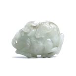 A CHINESE JADE 'HORSE AND MONKEY' BELT HOOK. Qing Dynasty, 18th Century. Carved in relief with a