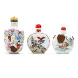 THREE CHINESE FAMILLE ROSE SNUFF BOTTLE. Comprising a moulded figurative snuff bottle, Qianlong