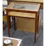 A mahogany and satinwood crossbanded bijouterie table on square legs and castors, 59cm wide.