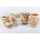 Six early 20th Century Charlotte Rhead pottery vases, by Crown Ducal and one Burleigh ware, in