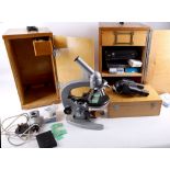 A 1950's Russian Lomo microscope with Zeiss fittings, with case and a 2nd box with additional