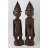 A pair of Yoruba tribal shrine figures.