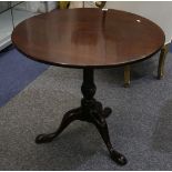 A Georgian mahogany circular tripod table on cabriole supports, 79cm.