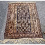 A fine Afghan Belouch rug, mid to late 20th Century, South West Afghanistan, 1.22m x 0.88m.