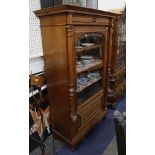 A late 19th Century French walnut side cabinet with glazed door, 111cm wide.