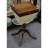 A 19th Century mahogany work table, on quadraform support.