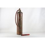 An early 20th Century copper and brass fire extinguisher with embossed manufacturers plates '