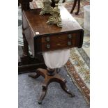 A Regency mahogany work table, with drop flaps and two drawers on sabre legged support, 47cm deep.