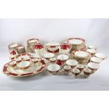 Royal Worcester, an extensive set of porcelain dinnerware all having shaped gadrooned rims with