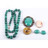 A small quantity of jewellery, to include a graduated malachite beaded necklace, an amber and