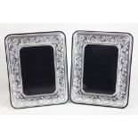A pair of silver photograph frames with embossed decoration, stamped 925, boxed. H: 19cm W: 14.5cm