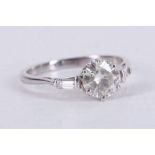 WITHDRAWN!!!!!!!!! A white metal and diamond ring, set round cut diamond of approx. 1.0 carat,