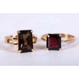 A 9 carat yellow gold and square step cut garnet ring, size: Q, together with a 14 carat yellow gold