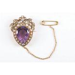 A 19th century yellow gold, amethyst, diamond, and split seed pearl heart-shaped brooch, contained