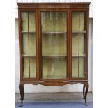 An Edwardian mahogany inlaid bow fronted display cabinet.