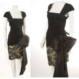 BASILLE COCKTAIL DRESS, 1980s, black silk and wool mix with oversized bow at one hip and ruched