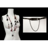 LOUIS VUITTON NECKLACE, large wooden beads and plastic flower heads, 50cm long overall, with dust