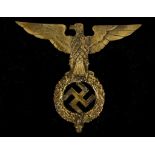 Brass 3rd Reich standard finial, eagle over laurel and swastika, approx. 205 x 16.5cm.