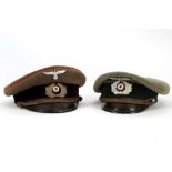 A German WWII visor cap, other ranks, panzer pink piping, later eagle and another Schirmmutze with