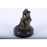 A modern bronze of a couple in an embrace, 14cm.