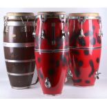 Three full size hide screen bongo drums, i.e. high, mid and low pitches.