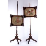 A pair of Victorian rosewood adjustable firescreens, the needlework panel within a carved frame, the