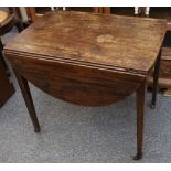 A George III mahogany Pembroke table, having one single drawer, raised on original castors. Height