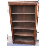 A late Victorian mahogany bookcase with moulded cornice enclosing adjustable four shelves.