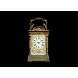 A LATE 19TH CENTURY FRENCH LACQUERED BRASS CARRIAGE CLOCK IN ORNATE ARCHED CASE the unusual case