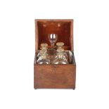 A LATE 18TH CENTURY MAHOGANY DECANTER BOX WITH FOUR DECANTERS, DISH AND GLASS the box with