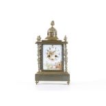 A LATE 19TH CENTURY FRENCH BRONZE AND PORCELAIN MOUNTED MANTEL CLOCK of architectural form,