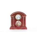 A MID 19TH CENTURY PORCELAIN MANTEL CLOCK the architectural, arched case modelled with four Doric