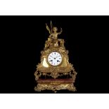 A MID 19TH CENTURY FRENCH GILT BRONZE FIGURAL MANTEL CLOCK OF MARITIME THEME the sailor seated on an