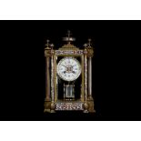 A LATE 19TH CENTURY FRENCH GILT BRONZE AND CHAMPLEVE ENAMEL FOUR GLASS MANTEL CLOCK the case