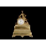 AN EARLY 19TH CENTURY FRENCH GILT BRONZE FIGURAL MANTEL CLOCK in the Orientalist taste, the case