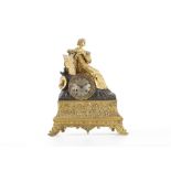 AN EARLY 19TH CENTURY FRENCH GILT AND PATINATED BRONZE FIGURAL MANTEL CLOCK BY VILLEMSENS modelled