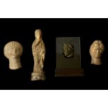 FOUR CLASSICAL ITEMS Including a Roman bronze fragment of a head in profile, 3cm high, a Greek