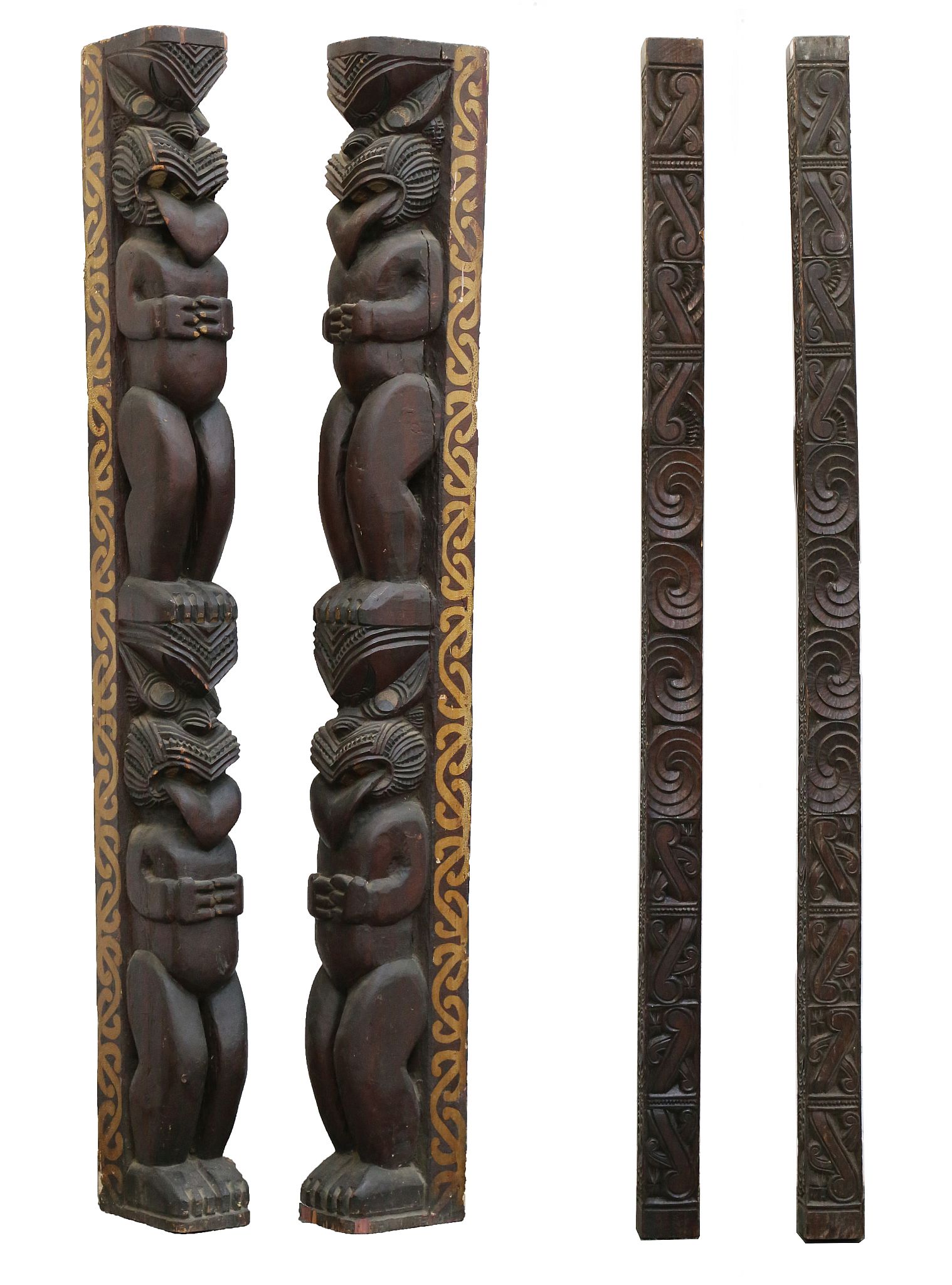 A PAIR OF MAORI CARVED POSTS, NEW ZEALAND  186cm high, together with two intricately carved cross