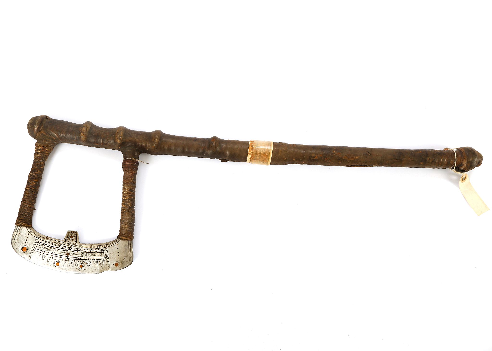 A WORJI WAR AXE, BAUCHI PROVINCE, NIGERIA With a open curved blade with incised decoration and