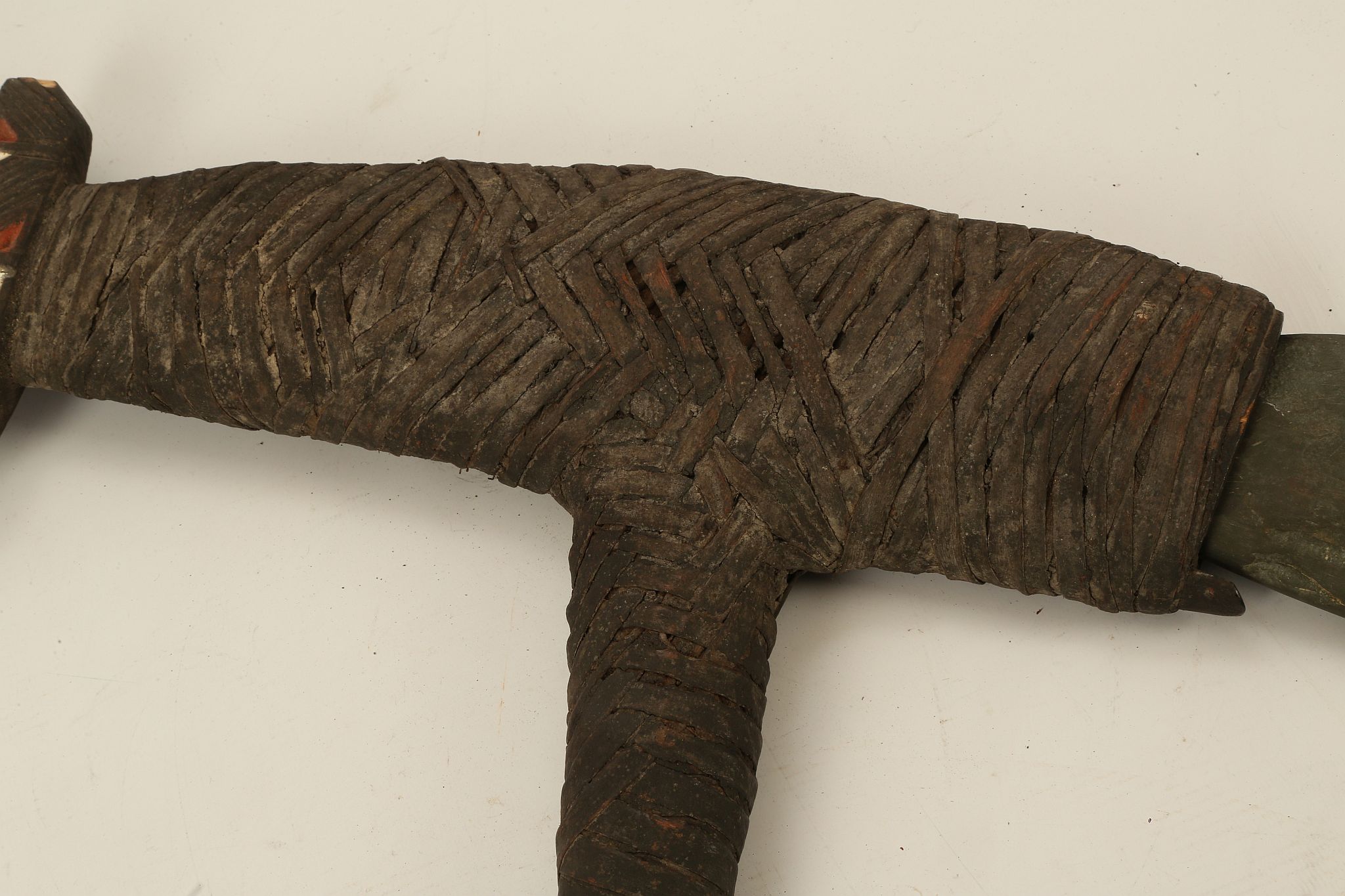 A LARGE ETHNOGRAPHIC SCHIST AXEHEAD 32.4cm long; with a wooden haft, 72cm high (2) - Image 3 of 5