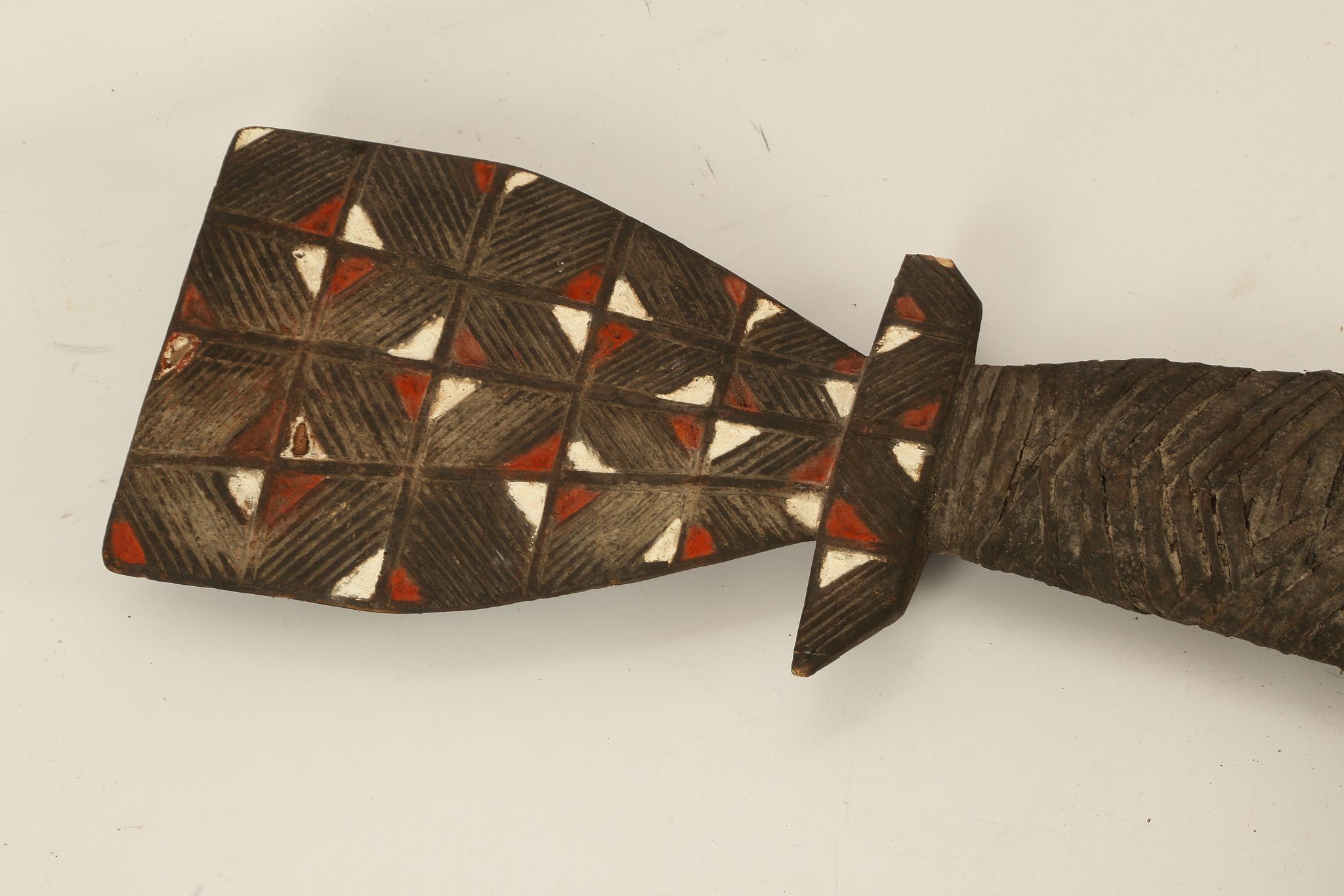 A LARGE ETHNOGRAPHIC SCHIST AXEHEAD 32.4cm long; with a wooden haft, 72cm high (2) - Image 2 of 5