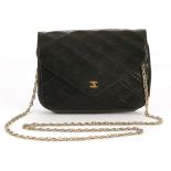 VINTAGE CHANEL FLAP HANDBAG, pre-serialisation, black quilted leather with pointed flap and gilt