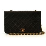 CHANEL FLAP HANDBAG, date code or 1989/91, black quilted leather with gilt tone hardware and twist