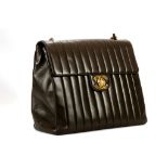 CHANEL DARK BROWN JUMBO FLAP BAG, date code for 1995, vertically quilted lambskin and gilt hardware,
