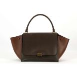 CELINE TRI-COLOUR TRAPEZE HANDBAG, in shades of brown with gilt metal hardware, 34cm wide (excluding